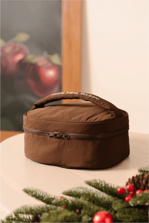 From This Island Puffy Pillow Travel Pouch